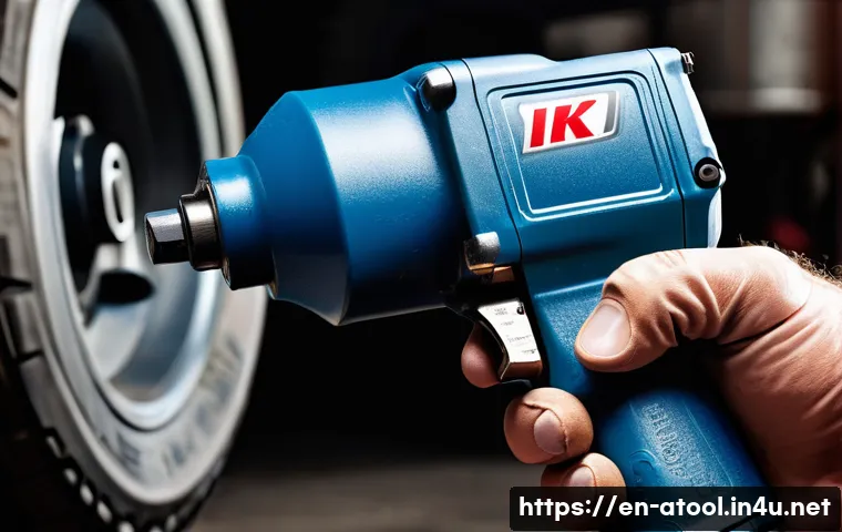 에어공구 브랜드 비교 - A high-detail close-up of a professional-grade air impact wrench in action, gripping a heavy-duty bo...